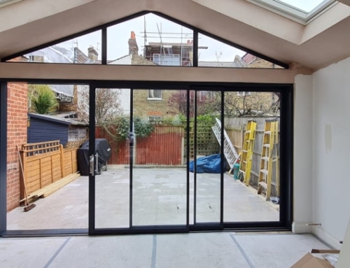 Supply and fit of OS-29 sliding doors and a gable window in Tooting