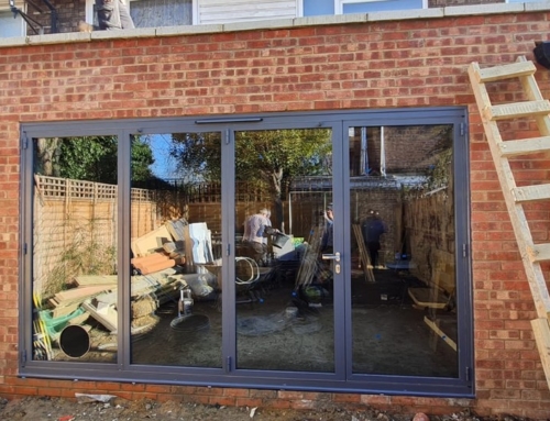 Supply and Fit of Origin OB72 Bifold Door with Cat Flap